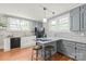 Updated kitchen featuring a breakfast bar, granite countertops and updated appliances at 319 S Oakland St, Gastonia, NC 28052