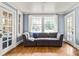 Cozy living room featuring natural light, hardwood floors and comfortable seating at 319 S Oakland St, Gastonia, NC 28052