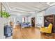 Spacious living room featuring hardwood floors, fireplace, and neutral decor, creating a warm and welcoming atmosphere at 319 S Oakland St, Gastonia, NC 28052