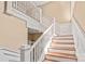 Elegant stairway showcasing detailed woodwork and a classic design at 319 S Oakland St, Gastonia, NC 28052