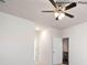 Bright bedroom with a ceiling fan and easy access to the kitchen and bathroom at 3407 Lacebark Ln, Gastonia, NC 28056
