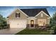 Charming home featuring a two-car garage, stone accents, and a well-maintained lawn at 3407 Lacebark Ln, Gastonia, NC 28056