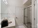 Modern bathroom with walk-in glass shower, clean lines, bright lighting, and essential fixtures at 400 N Church St # 226, Charlotte, NC 28202