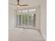 Bright, spacious bedroom with neutral carpet, large windows, and a ceiling fan; a tranquil retreat at 400 N Church St # 226, Charlotte, NC 28202