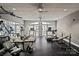 Community gym with treadmills, elliptical machines, and weight lifting equipment at 400 N Church St # 226, Charlotte, NC 28202