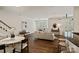 Open concept living area with hardwood floors, white walls, and a modern design, creating a welcoming atmosphere at 400 N Church St # 226, Charlotte, NC 28202