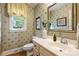 Elegant bathroom with ornate mirror, decorative wallpaper, and a bright window at 5508 Kincross Ln, Charlotte, NC 28277