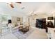 Versatile bonus room with a home office setup, comfortable seating, and soft area rug at 5508 Kincross Ln, Charlotte, NC 28277