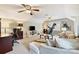 Spacious bonus room with plush seating, ample lighting, and a home office space at 5508 Kincross Ln, Charlotte, NC 28277
