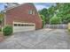 Detached two-car garage with an extensive concrete driveway providing ample parking for residents and guests at 5508 Kincross Ln, Charlotte, NC 28277