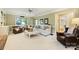 Comfortable living room with a large window, plush seating, and decorative accents, perfect for relaxation and gatherings at 5508 Kincross Ln, Charlotte, NC 28277