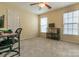 A cozy bedroom with carpet and natural light is shown at 5656 Cambridge Bay Dr, Charlotte, NC 28269