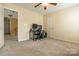 A cozy bedroom with carpet is shown at 5656 Cambridge Bay Dr, Charlotte, NC 28269