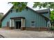 Charming clubhouse with an open entrance framed by columns and a convenient bike rack in front at 5656 Cambridge Bay Dr, Charlotte, NC 28269