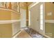 Inviting foyer with neutral paint and a decorative rug leading to an open doorway at 5656 Cambridge Bay Dr, Charlotte, NC 28269