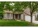 Charming brick home with a well-manicured lawn and inviting front entrance with a 'Welcome' sign at 5656 Cambridge Bay Dr, Charlotte, NC 28269