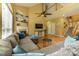Inviting living room showcasing fireplace, hardwood floors, and large sectional sofa at 5656 Cambridge Bay Dr, Charlotte, NC 28269