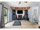 Bright living room with a fireplace and custom shelving at 5772 Gettysburg Nw Dr, Concord, NC 28027