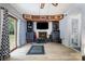 Bright living room with a fireplace and custom shelving at 5772 Gettysburg Nw Dr, Concord, NC 28027