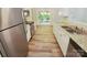 Modern kitchen with stainless steel appliances and sleek countertops at 6041 Misty Way Ln, Charlotte, NC 28212
