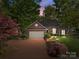 Charming brick home featuring a well-manicured lawn and a two-car garage at 617 Peace Haven Rd, Kannapolis, NC 28083