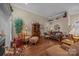 Cozy living room with hardwood floors, fireplace, stylish decor, and comfortable furniture at 617 Peace Haven Rd, Kannapolis, NC 28083