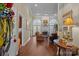 Elegant living room featuring hardwood floors, a fireplace, and plenty of natural light at 617 Peace Haven Rd, Kannapolis, NC 28083