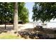 Private beach area with picnic table and lake access at 64 Timberidge Dr, Lake Wylie, SC 29710
