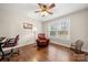 Bedroom or home office with hardwood floors, a large window, and natural light at 64 Timberidge Dr, Lake Wylie, SC 29710