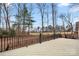 Large deck overlooks natural landscape, providing a private outdoor retreat with black metal railing at 64 Timberidge Dr, Lake Wylie, SC 29710