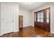 Inviting foyer features hardwood floors, a glass door and an interior closet with abundant storage at 64 Timberidge Dr, Lake Wylie, SC 29710