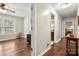 Hallway features hardwood floors and several doorways leading to other rooms at 64 Timberidge Dr, Lake Wylie, SC 29710