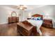 Comfortable main bedroom with hardwood floors and a ceiling fan for energy efficiency at 64 Timberidge Dr, Lake Wylie, SC 29710