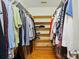 Walk-in closet with built-in shelving at 6717 Bickham Ln, Charlotte, NC 28269