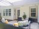 This backyard patio is perfect for outdoor living with stylish furniture and a welcoming ambiance at 7122 Marlin St, Gastonia, NC 28056