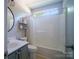 A well-lit bathroom with a tub-shower combo and modern fixtures at 7122 Marlin St, Gastonia, NC 28056