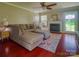 Inviting living room with a fireplace, comfortable seating, and warm hardwood floors at 7122 Marlin St, Gastonia, NC 28056