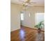 Bright room with wood-look floors, ceiling fan, and a window with blinds at 745 Rock Castle Dr, York, SC 29745