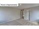 Cozy bedroom with soft carpet, a walk-in closet, and a neutral color palette at 8013 Kennesaw Dr, Gastonia, NC 28056