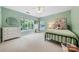 Spacious bedroom with many windows for ample light at 8709 Huntland Ct, Charlotte, NC 28277