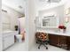 Functional bathroom with vanity, tub with shower, and decorative colorful accents at 9013 St Croix Ln, Charlotte, NC 28277