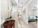 Inviting hallway with hardwood floors, views of the bedrooms, and a decorative mirror at 9013 St Croix Ln, Charlotte, NC 28277