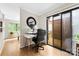 Bright home office with hardwood floors and sliding glass doors to the backyard at 9013 St Croix Ln, Charlotte, NC 28277