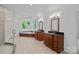 Spacious bathroom with double sinks, a walk in shower and relaxing soaking tub at 1001 Berwick Ct, Waxhaw, NC 28173