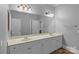 Bathroom with double vanity, large mirror, and ample storage space at 1001 Berwick Ct, Waxhaw, NC 28173