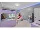 Bedroom with bunk bed, carpet floors, and natural light at 1001 Berwick Ct, Waxhaw, NC 28173