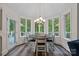 Bright breakfast nook with large windows and a view to the backyard at 1001 Berwick Ct, Waxhaw, NC 28173