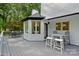 Charming outdoor deck with dining and seating areas, ideal for entertaining guests or enjoying a meal outside at 1001 Berwick Ct, Waxhaw, NC 28173