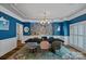 An elegant dining room with stylish decor and a chandelier creates a perfect atmosphere for gatherings at 1001 Berwick Ct, Waxhaw, NC 28173