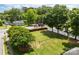 Large backyard with a privacy fence and mature trees surrounding the perimeter at 112 St Vincent Pl, Mount Holly, NC 28120